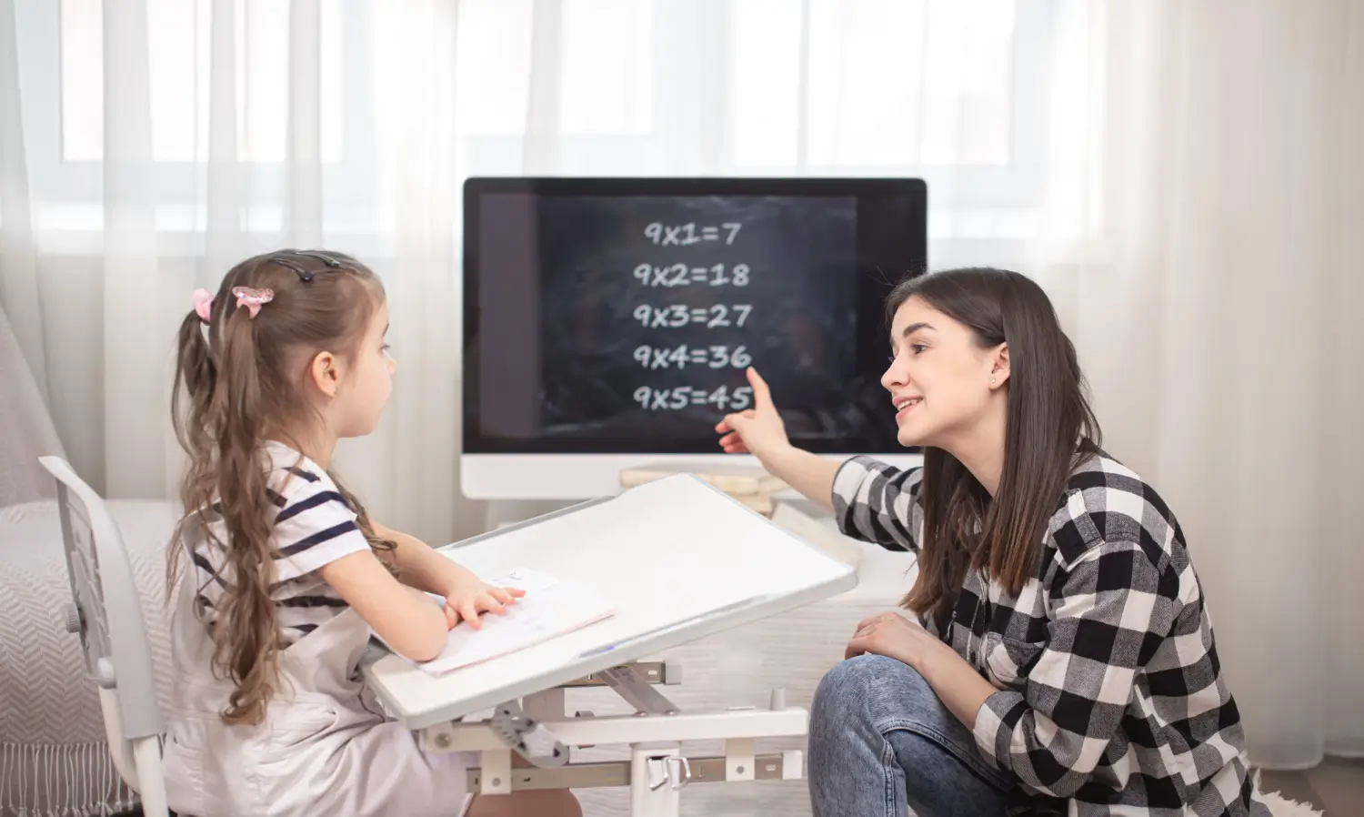 Mathematics tutor teaching student algebra in Dubai - private math tutoring services UAE